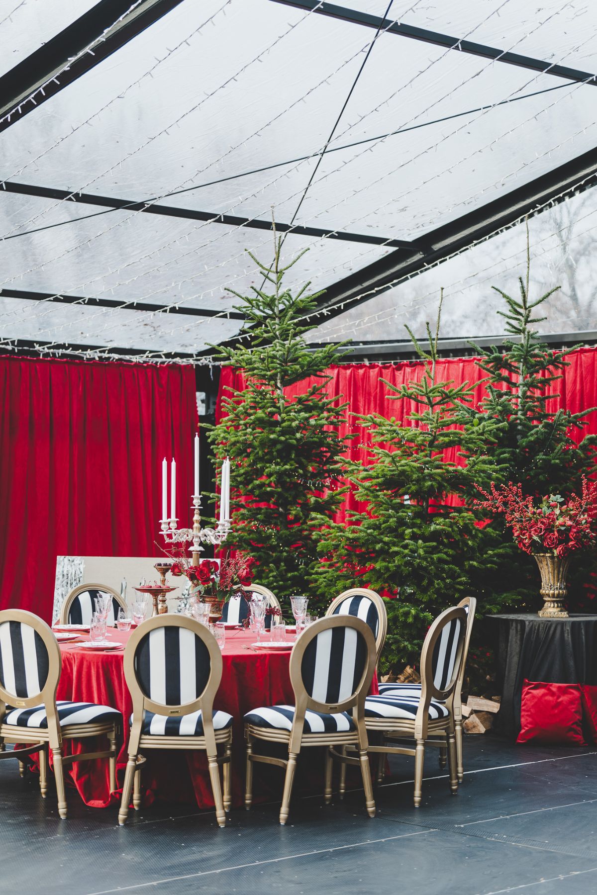 Christmas table with red velvet and Christmas trees at D'Orangerie
